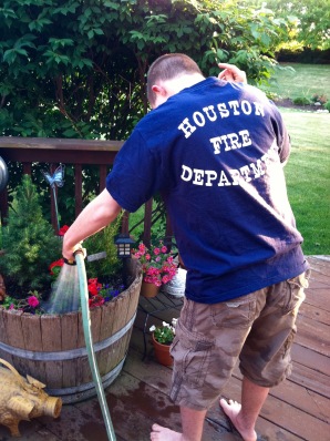 Nick watering plants